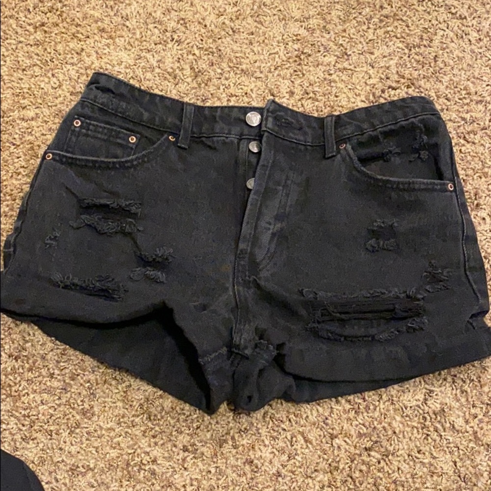 High waisted black distressed shorts